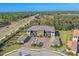 Aerial view of multi-Gathering units, garages, and parking areas in a residential neighborhood at 12410 Osorio Ct # 201, Sarasota, FL 34238