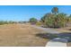 Expansive community green space with walking path and picturesque water views at 12410 Osorio Ct # 201, Sarasota, FL 34238