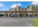 Carport parking with covered spaces and beautifully landscaped surroundings at 16904 Vardon Ter # 102, Bradenton, FL 34211