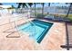 Relax in this community spa with tiled entry steps at 1863 Palm Springs St, Sarasota, FL 34234