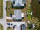 Birds eye view of property and lot showing the private dock on a canal at 1956 Greenlawn Dr, Englewood, FL 34223