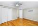 This is a bedroom with a closet, new floors, and light-colored walls at 1956 Greenlawn Dr, Englewood, FL 34223