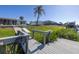 Private dock offering convenient access to the home, waterfront, and boat lift at 1956 Greenlawn Dr, Englewood, FL 34223