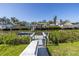 Private dock offering convenient access to waterways and boat lift at 1956 Greenlawn Dr, Englewood, FL 34223