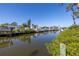 Scenic waterfront view showcasing canal access and serene surroundings at 1956 Greenlawn Dr, Englewood, FL 34223