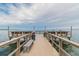 Pier stretches into the water, offering stunning views and a place to relax and enjoy the water at 2 Causeway Blvd # 206, Dunedin, FL 34698