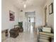 Inviting hallway with decorative accents and a glimpse into the bright, airy living spaces at 2 Causeway Blvd # 206, Dunedin, FL 34698