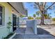 Inviting house exterior, showcasing a light yellow color and side patio at 2040 Palm Ter, Sarasota, FL 34231