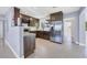 Modern kitchen with dark brown cabinets and stainless steel appliances at 2040 Palm Ter, Sarasota, FL 34231