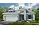 One-story home with gray siding, teal door, and a two-car garage at 26848 Dove Dr, Punta Gorda, FL 33955