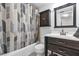 Well-maintained bathroom with a shower-tub combo, modern vanity, and neutral-toned decor at 3050 Lake Bayshore Dr # O-108, Bradenton, FL 34205