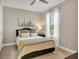 Cozy bedroom featuring neutral tones, natural light, and comfortable furnishings at 3105 Formia Ct, Bradenton, FL 34211