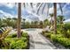 Relaxing hot tub area with lush landscaping and lounge seating, perfect for unwinding at 3105 Formia Ct, Bradenton, FL 34211