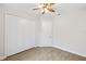 Bedroom with wood-look floors and a large closet at 336 Milford St, Port Charlotte, FL 33953