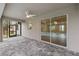 Covered patio with brick pavers, ceiling fan and view of the pool at 336 Milford St, Port Charlotte, FL 33953