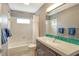 Bathroom with tub, shower, and modern vanity at 4147 Marseilles Ave # 3068, Sarasota, FL 34233