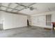 Attached garage with ample storage cabinets and workshop space at 4147 Marseilles Ave # 3068, Sarasota, FL 34233