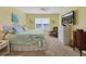 Main bedroom with large bed, TV, and ample closet space at 431 Gris Sky Ln, Bradenton, FL 34212