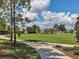 Green space with walking path and soccer goal at 431 Gris Sky Ln, Bradenton, FL 34212