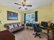 Home office with a comfortable sofa and a work desk at 431 Gris Sky Ln, Bradenton, FL 34212