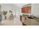 Kitchen featuring stainless steel appliances, granite countertops, and a dining nook at 4969 Creekside Trl, Sarasota, FL 34243