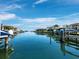 Scenic view of the waterway lined with luxury homes and private boat docks at 500 Harbor Point Rd, Longboat Key, FL 34228