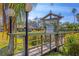 Charming footbridge over pond leading to Barrington Woods pool at 5041 Barrington Cir # 802, Sarasota, FL 34234