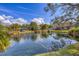 Serene pond with fountain in Barrington Woods community at 5041 Barrington Cir # 802, Sarasota, FL 34234