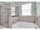 Bathroom features a luxurious soaking tub and separate walk-in shower at 5718 Broad River Run, Ellenton, FL 34222