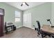 Bedroom with desk, chair, and neutral paint, ready for study or work at 5718 Broad River Run, Ellenton, FL 34222