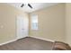 Empty bedroom with a ceiling fan, laminate flooring, and natural light at 5718 Broad River Run, Ellenton, FL 34222