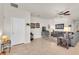 Inviting living room with ceiling fan, tile floors, and neutral walls and decorations at 5718 Broad River Run, Ellenton, FL 34222