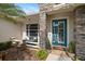 Inviting front entrance features double doors, stone accents, and a bench at 6373 Royal Tern Cir, Bradenton, FL 34202