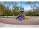 Outdoor playground with colorful slides, structures and benches in a beautiful community park at 6373 Royal Tern Cir, Bradenton, FL 34202