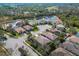 An aerial of the neighborhood showing the lush landscape, ponds, and the layout of the community at 6807 46Th E Ter, Bradenton, FL 34203