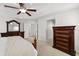 Spacious bedroom with neutral decor and a ceiling fan, offering comfort and style at 6807 46Th E Ter, Bradenton, FL 34203