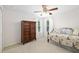 Cozy bedroom with warm natural light and a daybed for relaxing at 6807 46Th E Ter, Bradenton, FL 34203