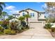 Beautiful two-story home featuring a two-car garage and well-manicured landscaping at 6807 46Th E Ter, Bradenton, FL 34203