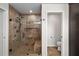 Bathroom featuring a tiled shower and separate toilet room at 6807 46Th E Ter, Bradenton, FL 34203