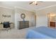 Spacious bedroom offering a study space, dresser and access to an en-suite bathroom at 7212 Ketch Pl, Bradenton, FL 34212