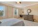 Comfortable bedroom with ample natural light, a desk area, and stylish decor at 7212 Ketch Pl, Bradenton, FL 34212