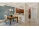 Dining area with elegant lighting, and a view of the kitchen at 7212 Ketch Pl, Bradenton, FL 34212