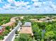 Wide aerial view of the townhome community and surrounding landscape at 7350 Black Walnut Way, Lakewood Ranch, FL 34202