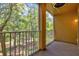 Private balcony overlooking a wooded area, perfect for relaxing at 7350 Black Walnut Way, Lakewood Ranch, FL 34202