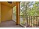 Private balcony with scenic wooded views at 7350 Black Walnut Way, Lakewood Ranch, FL 34202