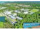 Aerial view of Pine View School campus showcasing the various buildings, sports fields, and surrounding greenery at 779 Fordingbridge Way, Osprey, FL 34229