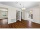 Bright dining room with hardwood floors and chandelier at 7805 Capwood Ave, Temple Terrace, FL 33637