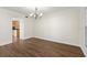 Bright dining room with hardwood floors and a chandelier at 7805 Capwood Ave, Temple Terrace, FL 33637