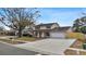 Two-story house with a two car garage and manicured lawn at 7805 Capwood Ave, Temple Terrace, FL 33637