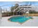 Relaxing screened-in pool with large patio at 7805 Capwood Ave, Temple Terrace, FL 33637